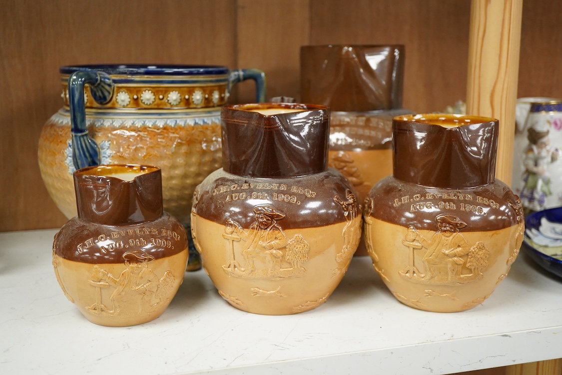 Four graduated Royal Doulton harvest jugs and a Royal Doulton Lambeth three footed jardiniere- 17cm high